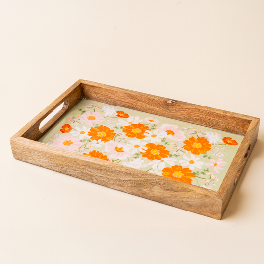 The-darling-effect Bouquet Beauty Sage Rectangle Wood Enamel Tray features cutout handles and a glass-topped green surface with orange, white, and pink floral print—a charming decorative organizer for any space.