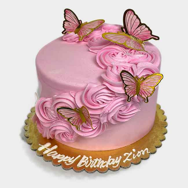 Pink Butterflies and Rosettes Cake decorated with pink and gold butterflies