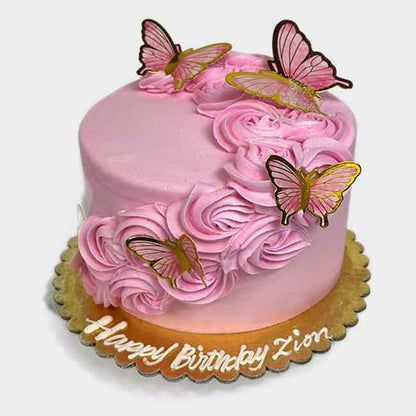 Pink Butterflies and Rosettes Cake decorated with pink and gold butterflies