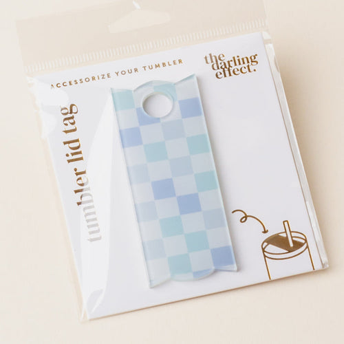 The Darling Effect's Check Blue Tumbler Lid Tag features a light blue and white checkered design, labeled "Tumbler Lid Tag," and fits Stanley Quencher 2.0 lids—perfect for your Take Me Everywhere Tumblers.