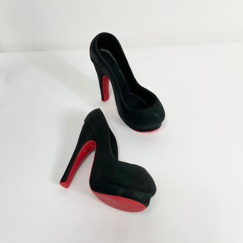 Our signature platform shoe in solid black chocolate with a trendy red bottom.