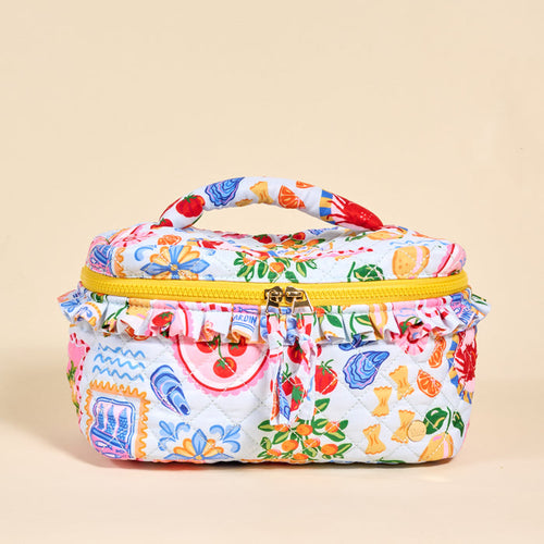 The Darling Effect's Ciao Bella Glam & Go Quilted Cosmetic Bag features a colorful Italian food print on white, a yellow zipper and handle, and is water-resistant—perfect for travel or daily use.
