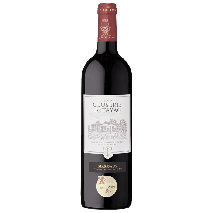 Bottle of Closérie de Tayac Margaux wine on a green background