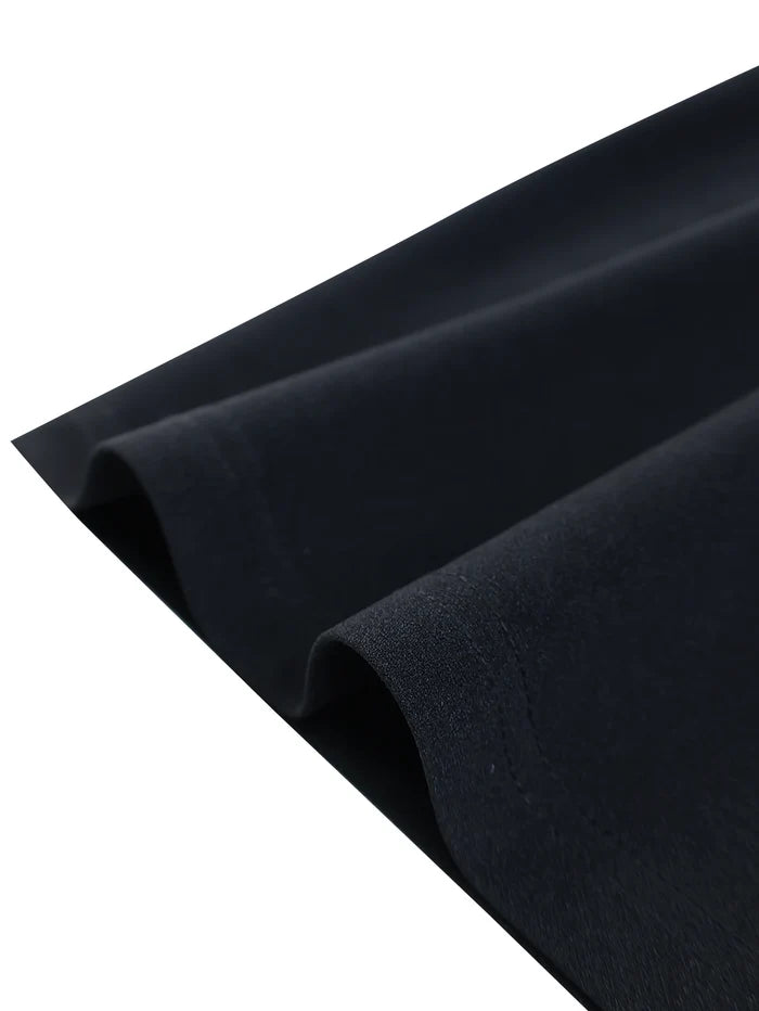 Black fabric with a slight texture on a white background