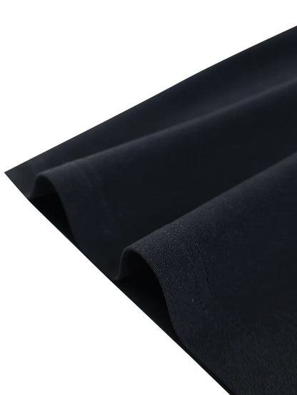 Black fabric with a slight texture on a white background