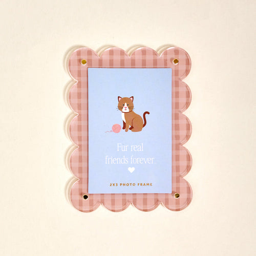 Display the Cool Cat Mini Acrylic Picture Frame Magnet by The Darling Effect on your fridge—features a pink gingham scalloped frame, blue insert with a cat and yarn, and the phrase "Fur real friends forever" above a heart.