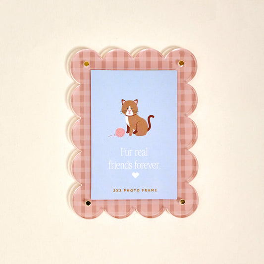 Display the Cool Cat Mini Acrylic Picture Frame Magnet by The Darling Effect on your fridge—features a pink gingham scalloped frame, blue insert with a cat and yarn, and the phrase "Fur real friends forever" above a heart.