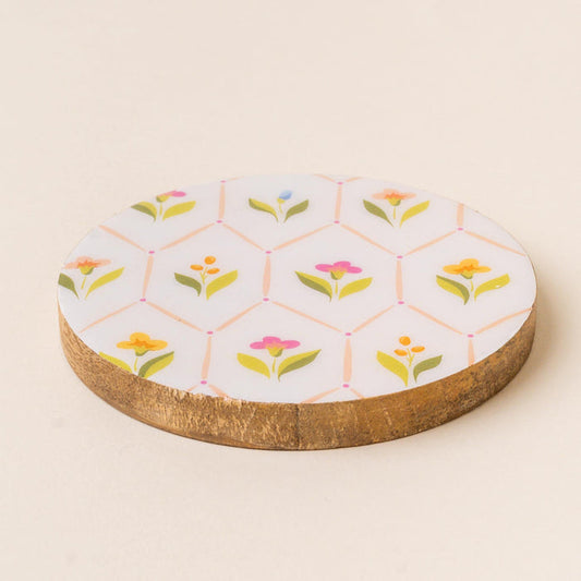 The-darling-effect's Handpicked for You Wood Enamel Coaster features a white enamel top with a geometric floral and green leaf pattern—making it a charming decorative addition to your coaster collection.