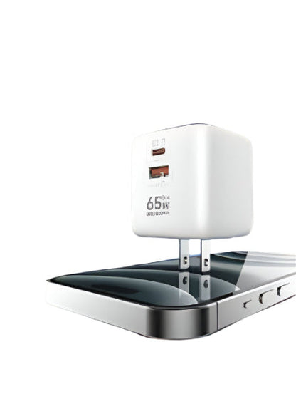 65W fast charging adapter with smartphone on a blue gradient background