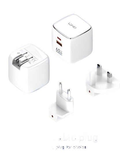 Set of USB power adapters with replaceable plugs on a blue background