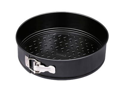 Round springform pan made of black non-stick metal.
