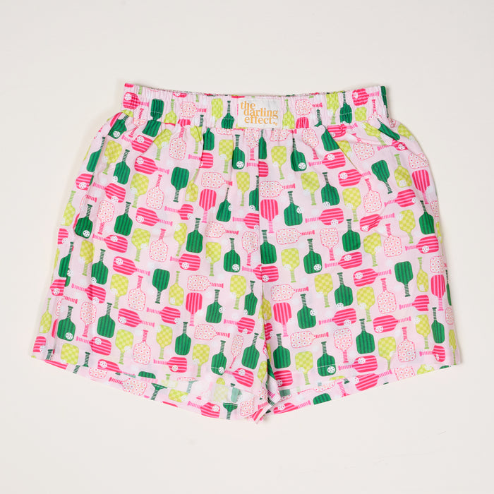 The Darling Effect Pickleball Party All Day Boxer Shorts feature a relaxed fit and elastic waistband, with a vibrant cactus and succulent print in green, pink, and red on white, made from breathable fabric for all-day comfort.