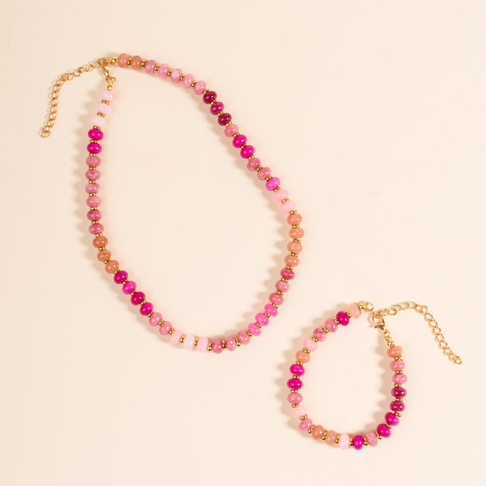 The Darling Effect's Pretty Pinks Stone Candy Bracelet is perfect for layering with your favorite colorful stone bracelets or other jewelry.
