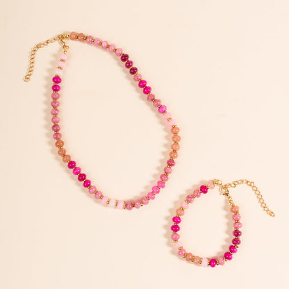 The Darling Effect's Pretty Pinks Stone Candy Bracelet is perfect for layering with your favorite colorful stone bracelets or other jewelry.