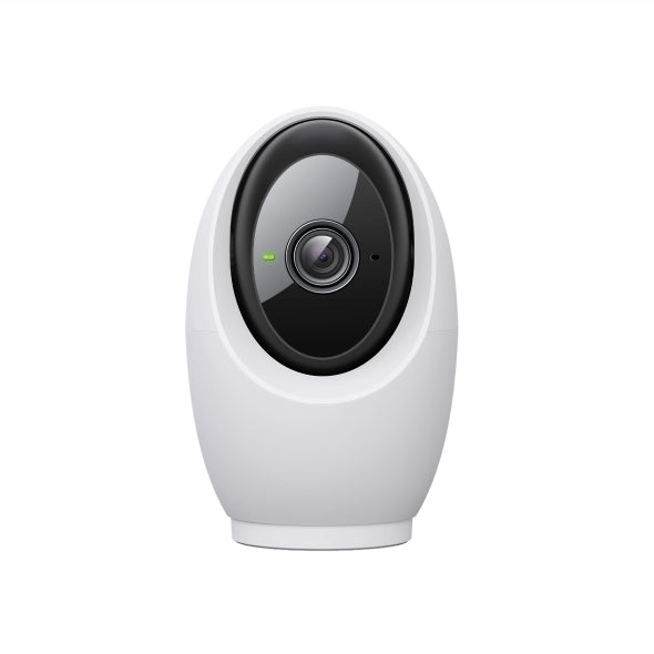 White security camera with black lens on a white background