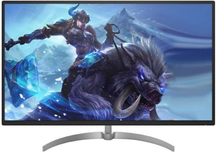 Gaming monitor displaying an animated character and creature on a blue background