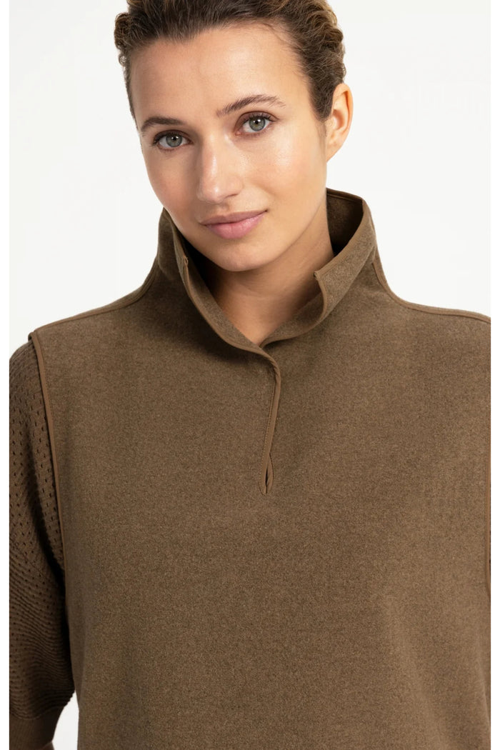 Close-up of a woman wearing YAYA 02-021008-608 Wool Blend Body Warmer with Stand-up Collar Teak Brown by YAYA, shop Dotique