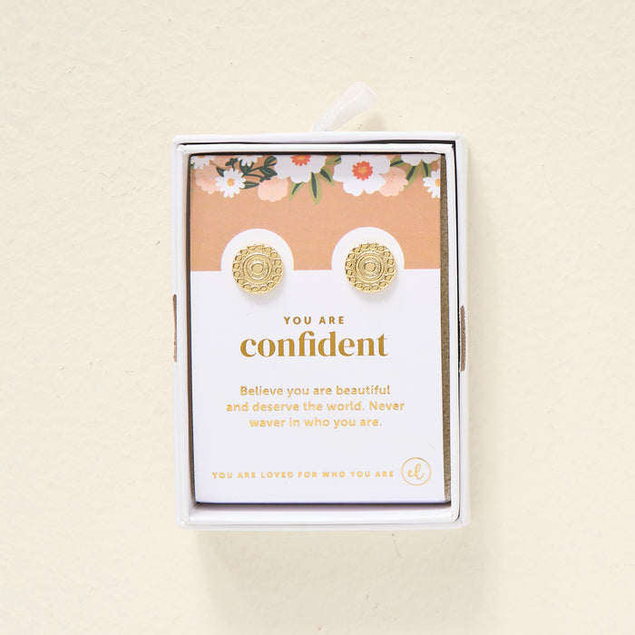 The Darling Effect’s You Are Confident Dainty Stud Earrings arrive gift-ready on a floral card with the message: "You are confident. Believe you are beautiful and deserve the world. Never waver in who you are.