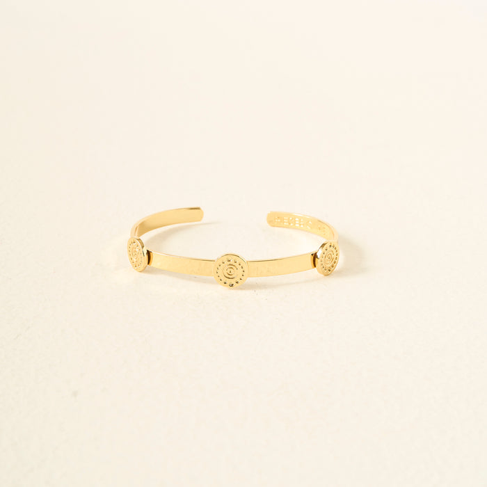 The Darling Effect's You Are Creative Skinny Stacker Bracelet is a 14k gold plated adjustable cuff with three engraved circles, shown on a light beige background—an ideal gift-ready jewelry piece.