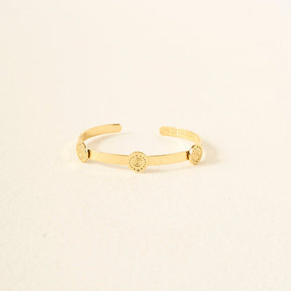 The Darling Effect's You Are Creative Skinny Stacker Bracelet is a 14k gold plated adjustable cuff with three engraved circles, shown on a light beige background—an ideal gift-ready jewelry piece.