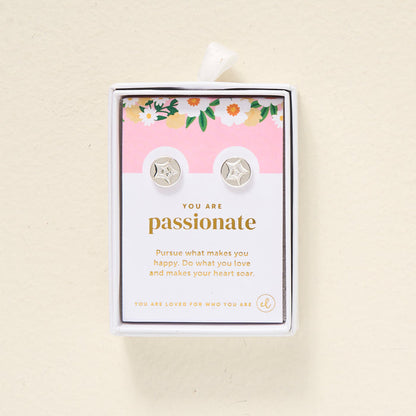 The Darling Effect's You Are Passionate Dainty Stud Earrings feature sterling silver star studs on a floral card with the message: "You are passionate. Pursue what makes you happy. Do what you love and makes your heart soar.